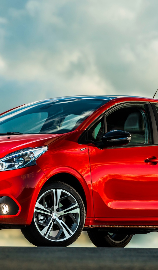 Красный автомобиль хэтчбек  Peugeot 208 GT