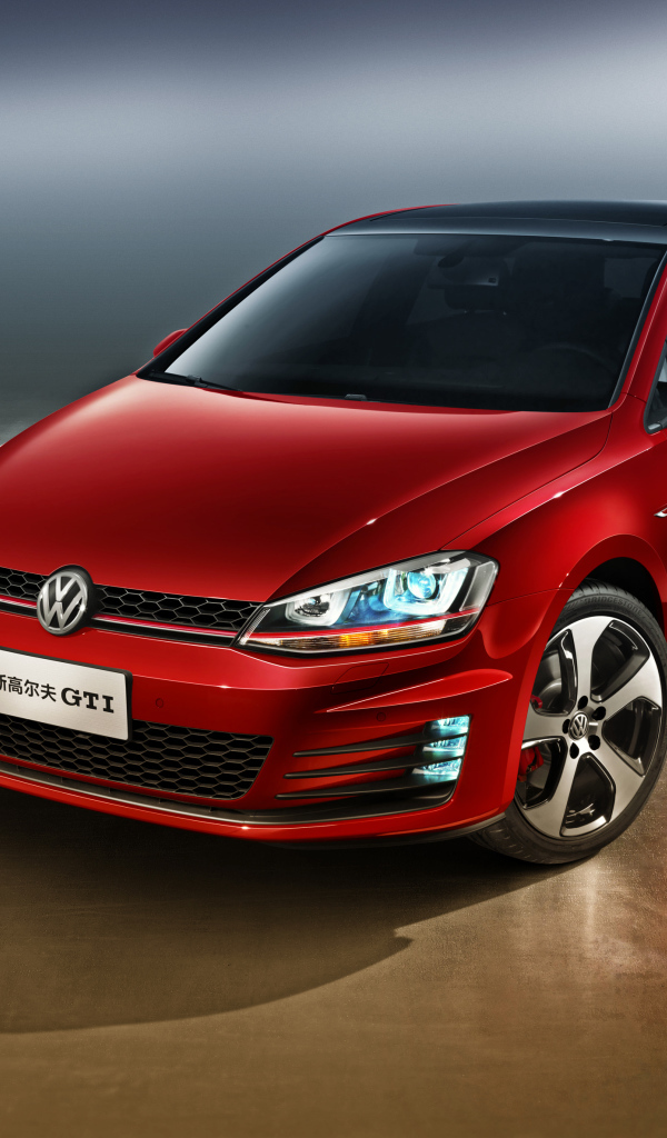 Автомобиль Volkswagen Golf GTI красного цвета 