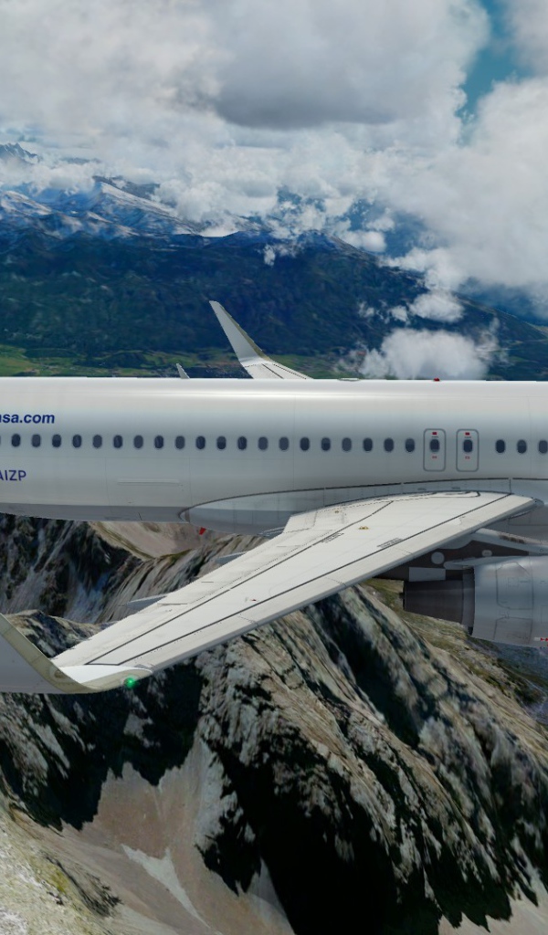 Airbus A320 авиакомпании Lufthansa полет над горами 