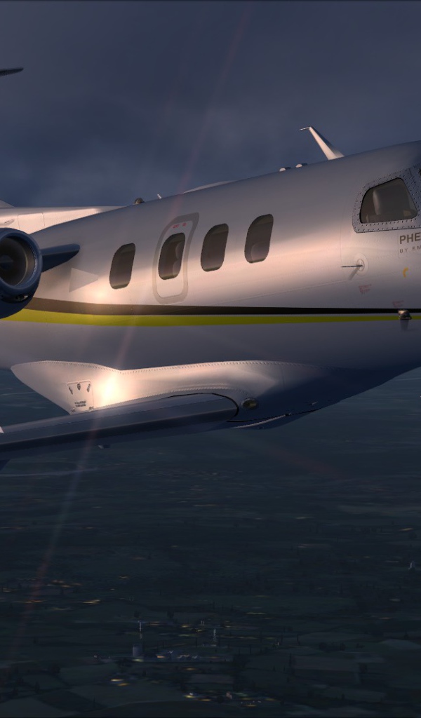 Embraer Phenom 100 в небе 