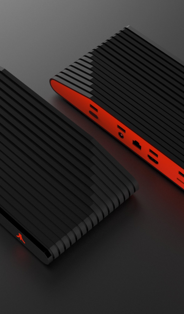 Новый игровой консоль Ataribox, 2018 на сером фоне