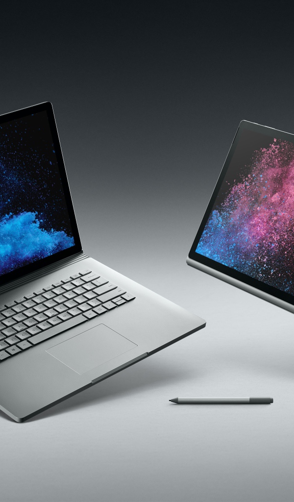 Стильные  ноутбуки Microsoft Surface Book 2, 2017 на сером фоне