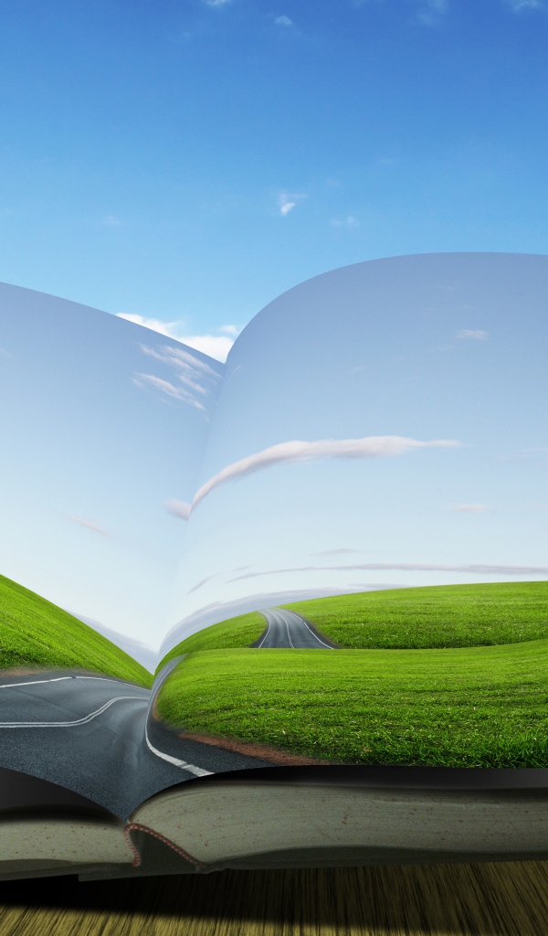 Зеленое дерево растет из книги на фоне голубого неба