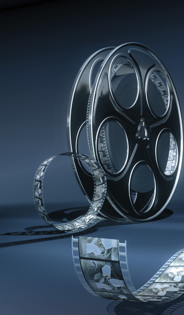 Кинопленка на бобине серый фон 