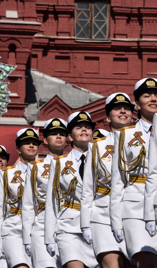 Girls in white military uniform on Victory Day parade on May 9