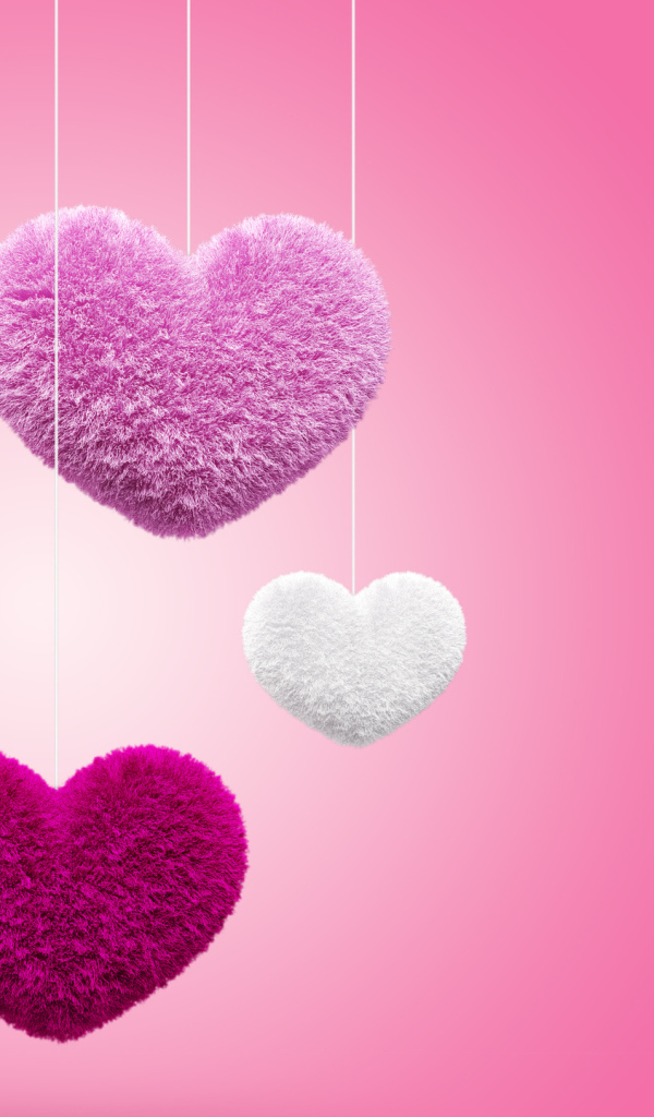 Мягкие пушистые сердечки на розовом фоне 