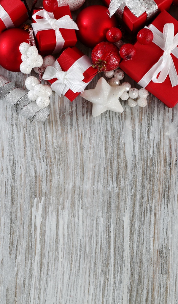 Holiday decorations in red on a gray background