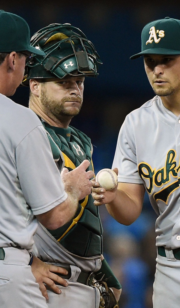 Тренер  по бейсболу Боб Мелвин с бейсболистами 