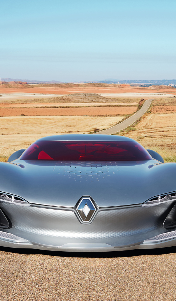 Стильный серебристый электромобиль  Renault Trezor на трассе 