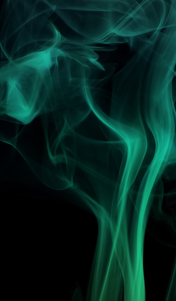 Зеленый дым на черном фоне