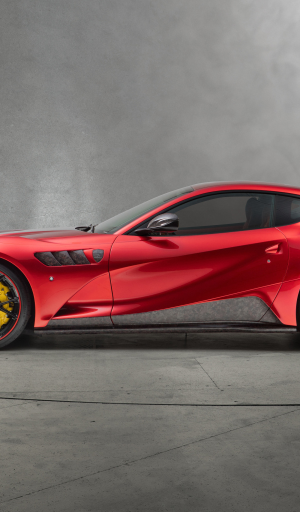 Красный спортивный автомобиль Mansory Stallone 2018 года вид сбоку