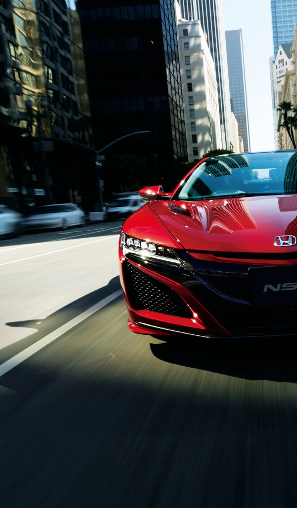 Стильный бордовый автомобиль Honda NSX 2018 года на трассе