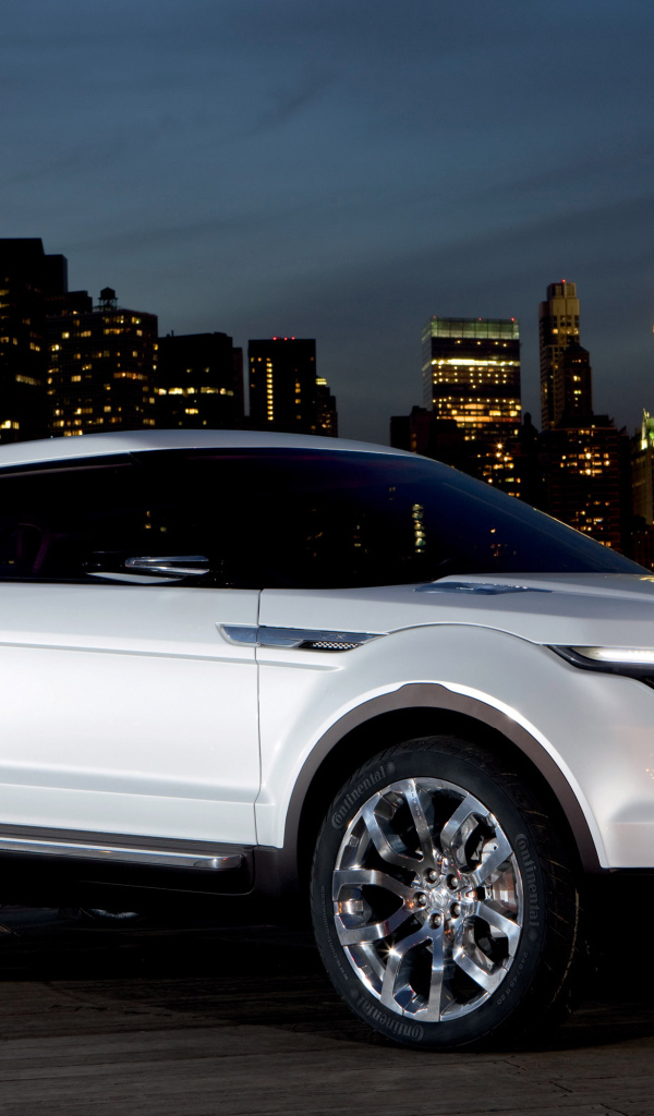 White SUV Range Rover LRX on city background