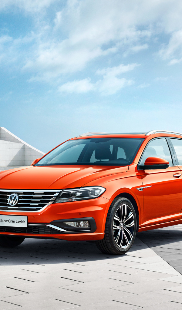 Красный автомобиль Volkswagen Gran Lavida, 2018