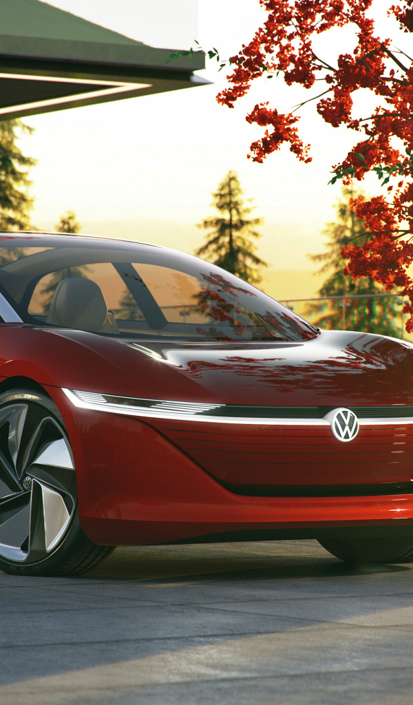 Красный автомобиль Volkswagen Id Vizzion 2018 в лучах солнца