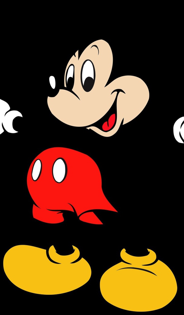 Популярный герой мультфильмов Микки Маус на черном фоне