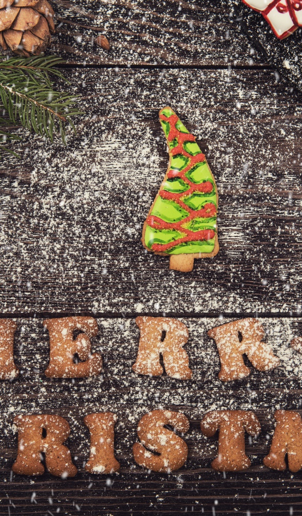 Рождественское печенье на деревянном фоне