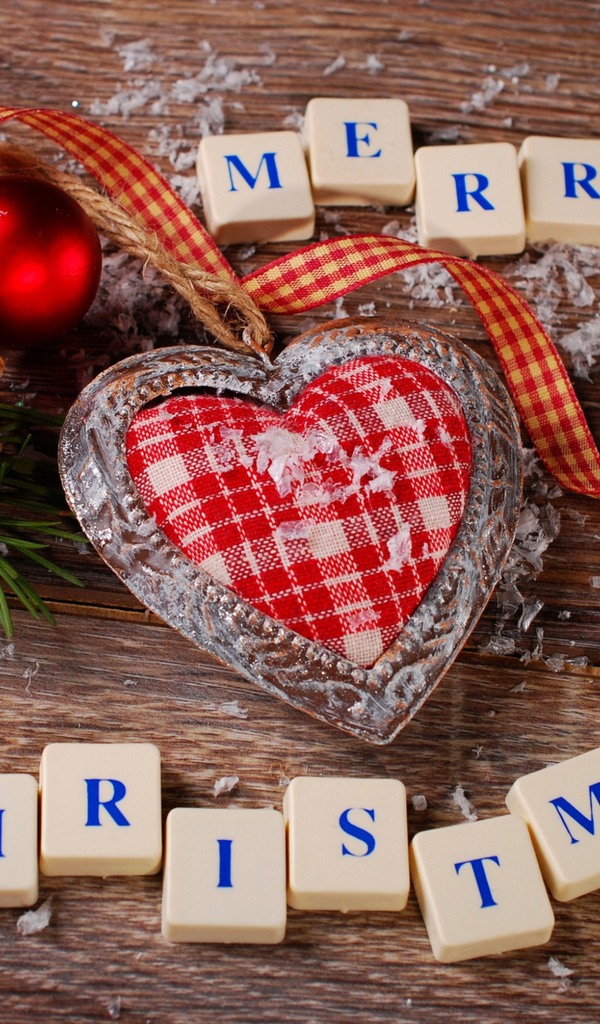 Heart with a fir branch and toys with cubes for Christmas