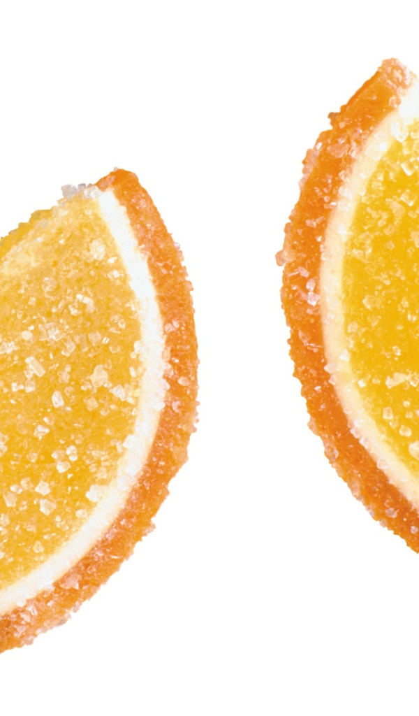 Две конфеты желе в сахаре на белом фоне