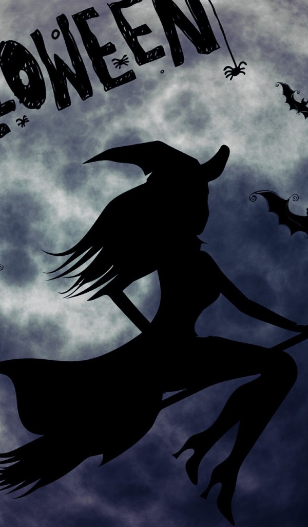 Ведьма на метле на фоне луны на праздник Хэллоуин, 31 октября