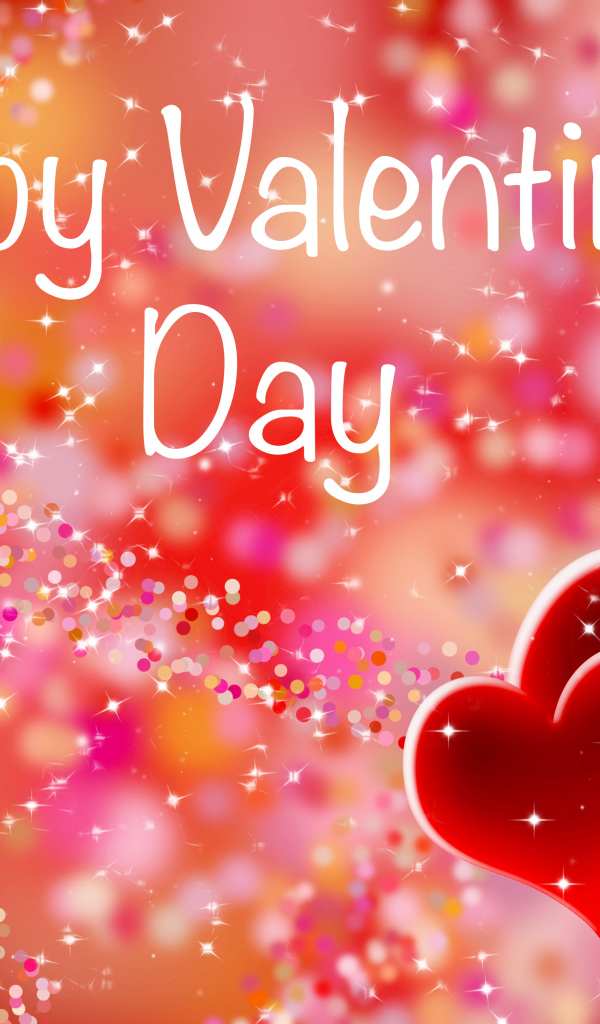 Два красных сердца на мерцающем фоне на День Святого Валентина