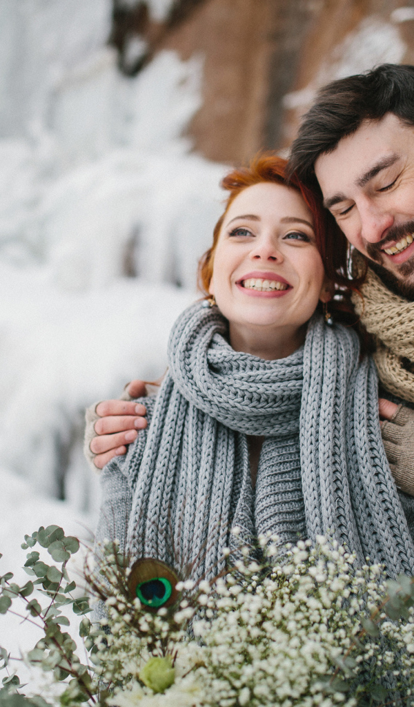 Happy couple in love in winter