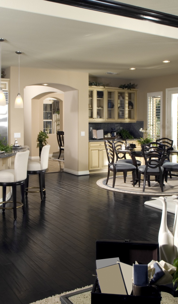 Красивая гостинная с кухней в пастельных тонах 