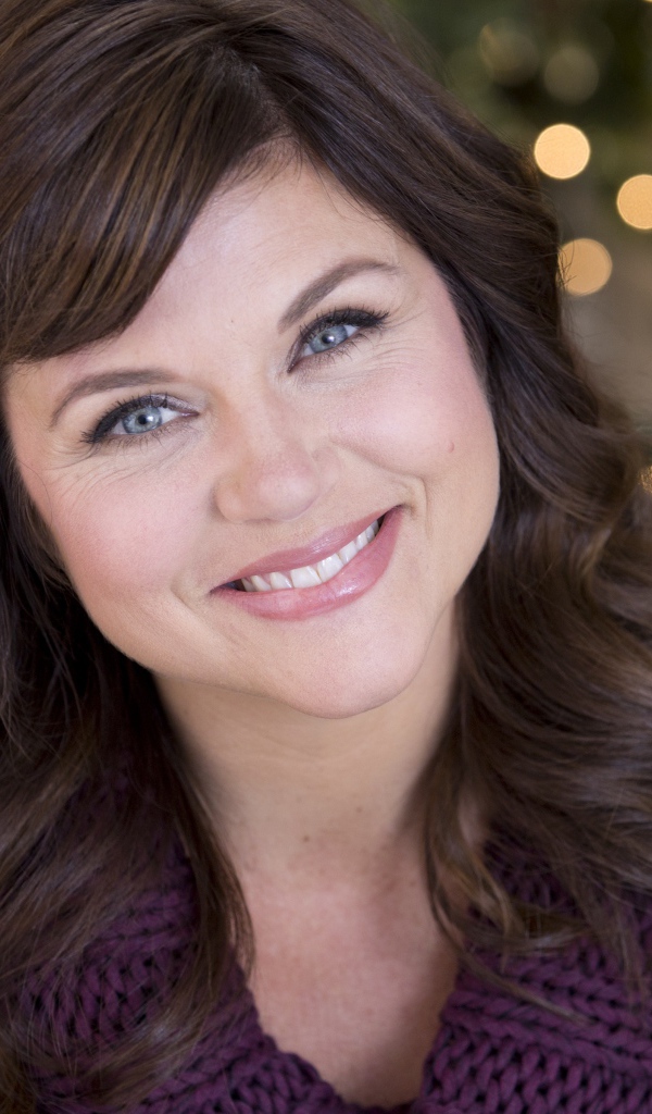 Милая голубоглазая улыбающаяся актриса Тиффани Тиссен