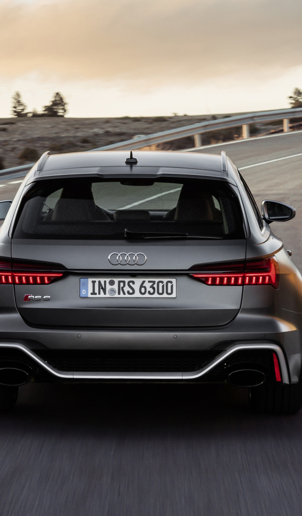 Silver car Audi RS 6 Avant 2019 on the road