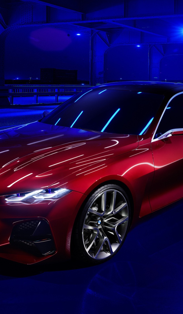 Красный автомобиль BMW Concept 4 2019 года в неоновом свете на мосту