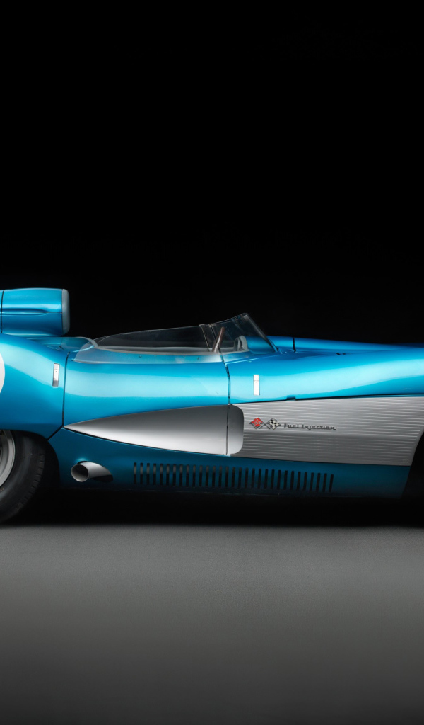 Спортивный ретро автомобиль Chevrolet Corvette SS XP 64,  1957 года на черном фоне