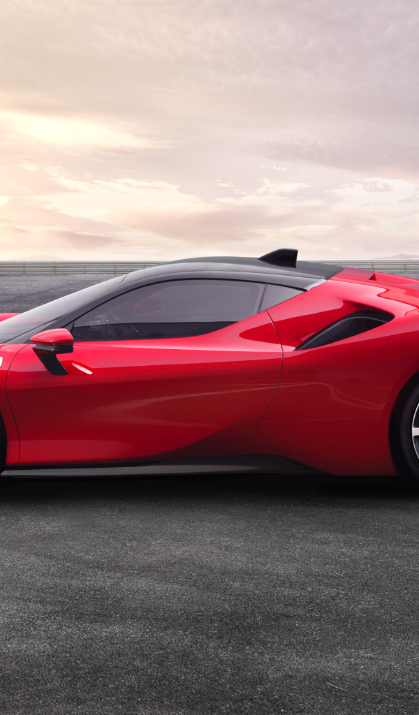 Красный спортивный автомобиль Ferrari SF90, 2019 года вид сбоку