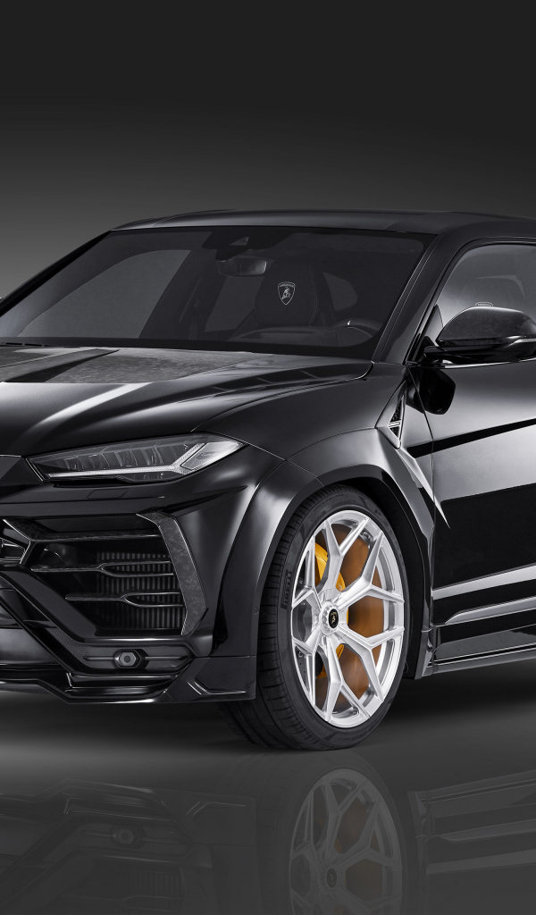 Черный  Lamborghini Urus Esteso 2019 года на сером фоне