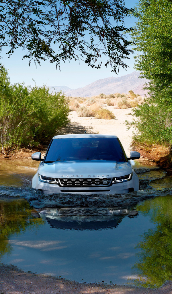 White SUV Range Rover Evoque rides on water