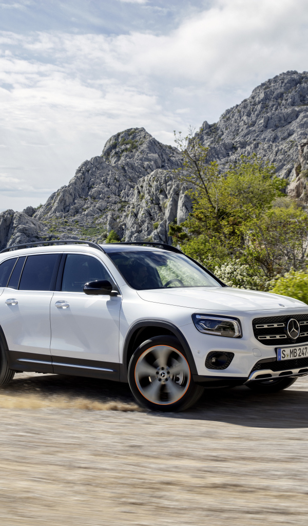 White Mercedes-Benz GLB-Class SUV in the mountains