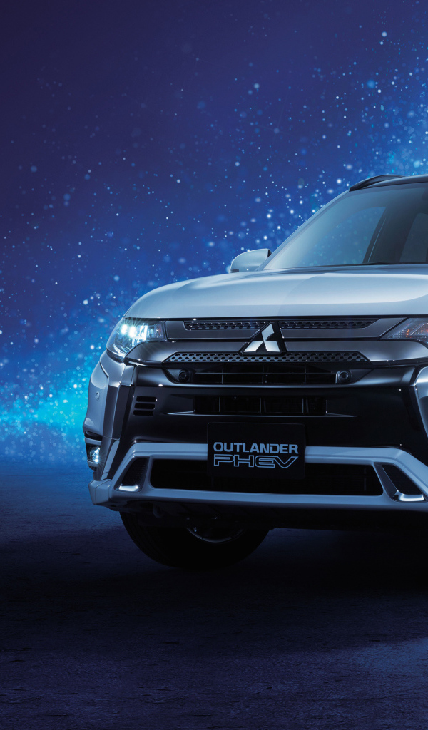 Внедорожник Mitsubishi Outlander  2018 года на неоновом фоне