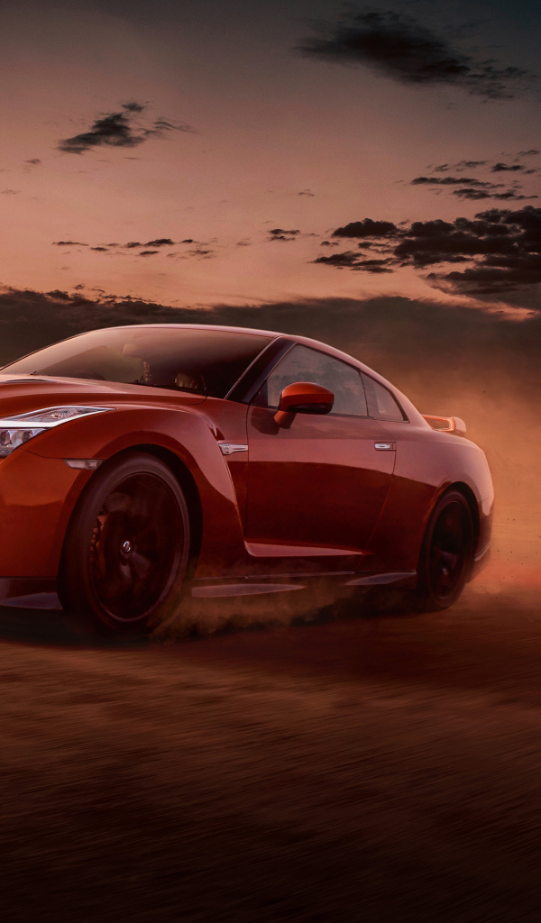 Красный автомобиль Nissan GT-R вечером