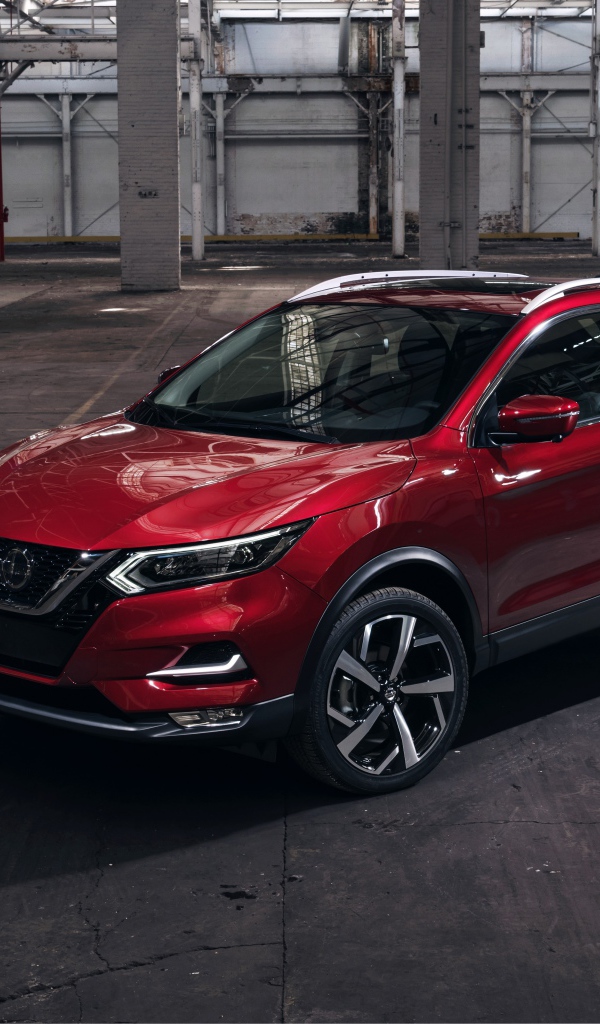 Красный автомобиль Nissan Rogue 