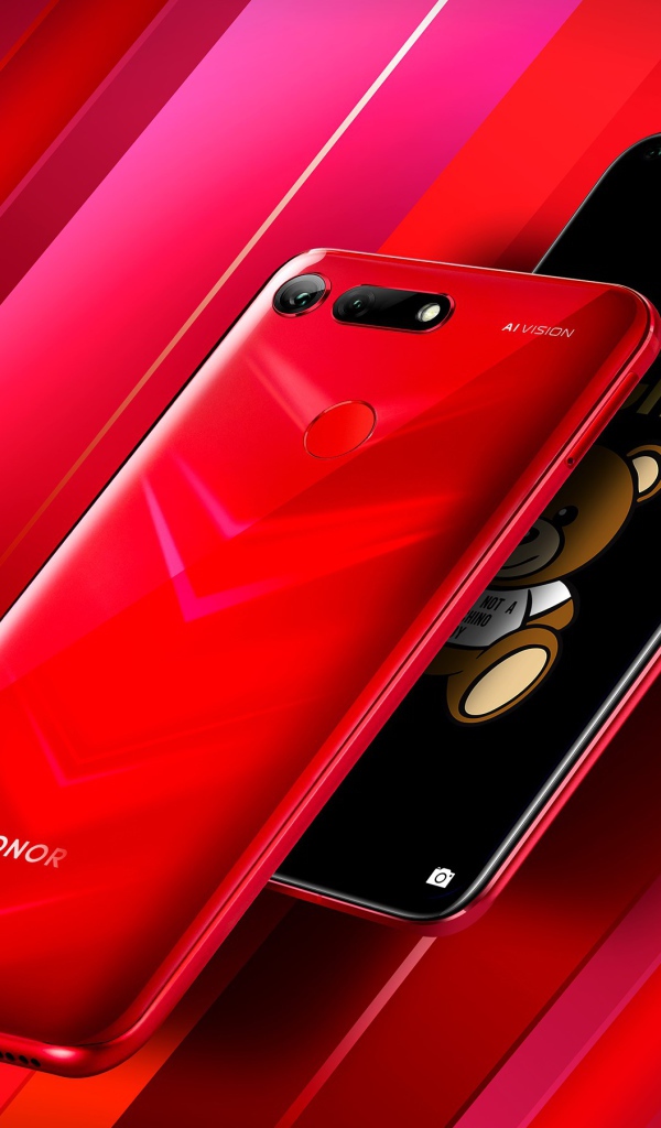 Стильный тонкий смартфон Honor View 20 на красном фоне