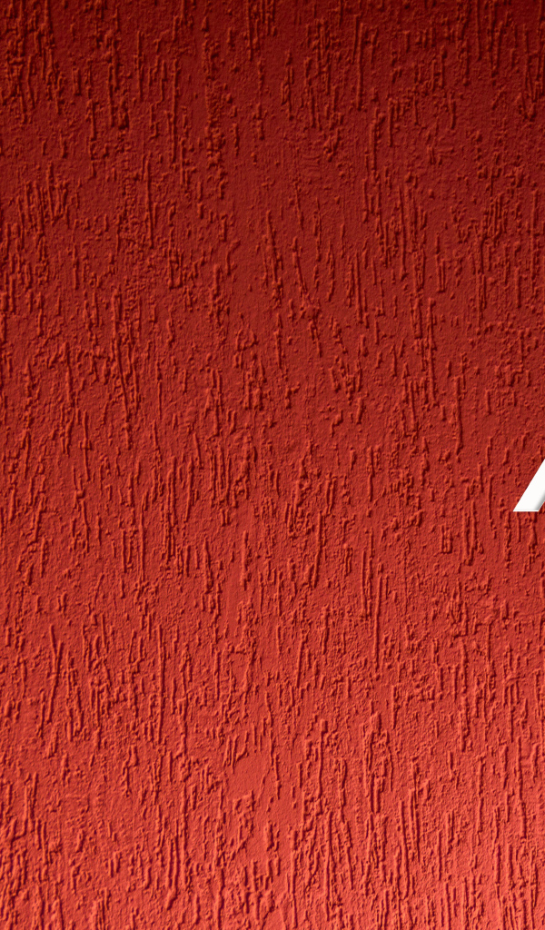 Белый логотип ASUS на красном фоне