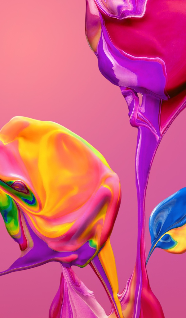 Разноцветные краски смешиваются на розовом фоне