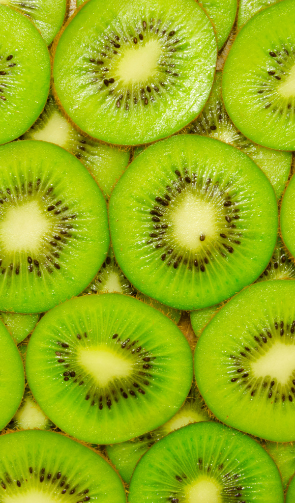Фон из сочных кусочков киви крупным планом