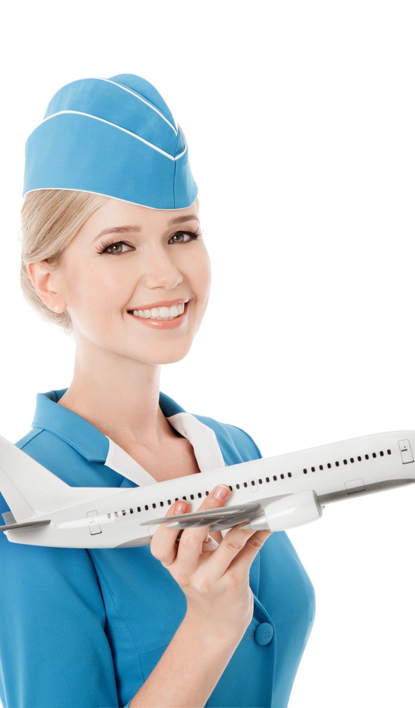 Девушка стюардесса с самолетом в руке на белом фоне