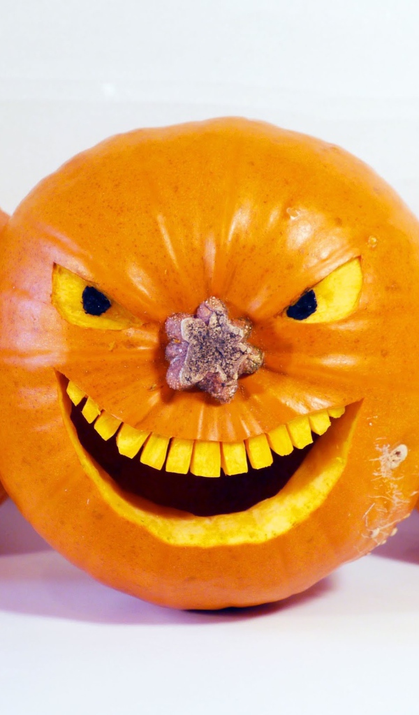 Зловещие тыквы на белом фоне на Хэллоуин 