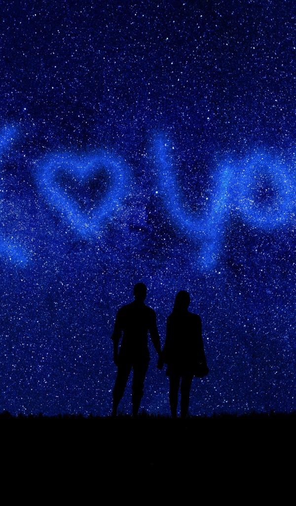 Влюбленная пара на фоне неба с надписью я тебя люблю 