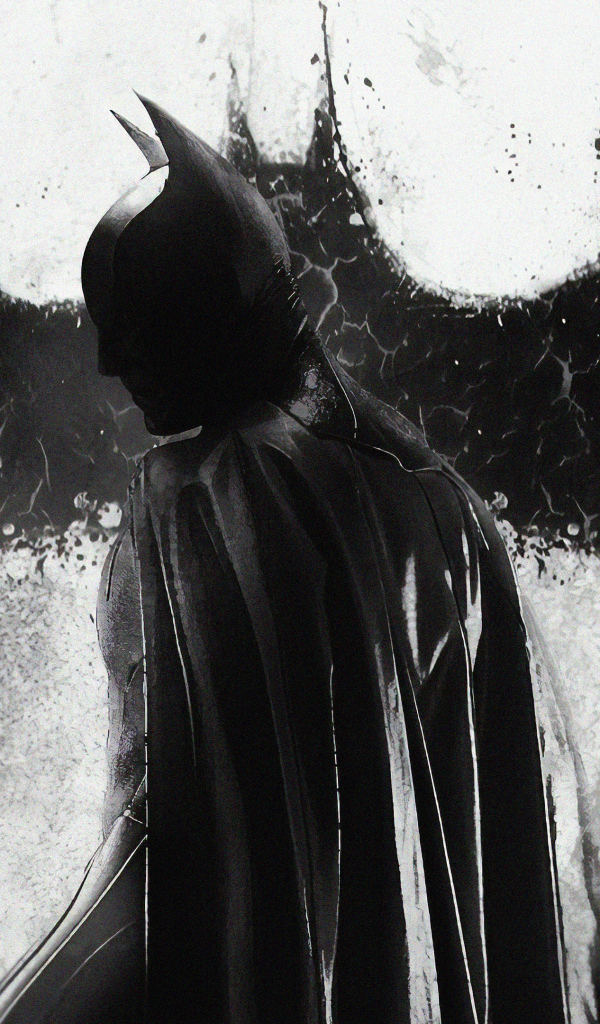 Бэтмен на фоне рисунка летучей мыши на стене