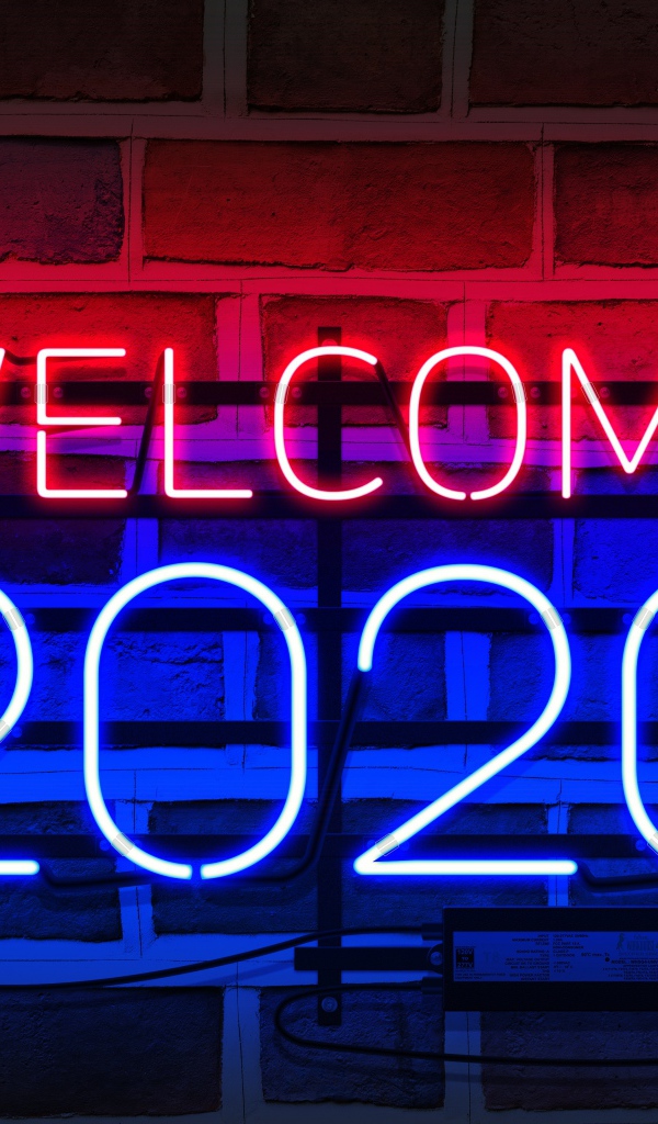 Неоновая надпись Welcome 2020 на стене