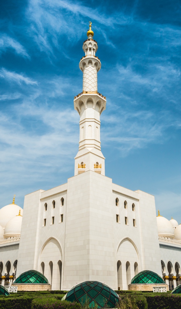 White mosque under a beautiful blue sky