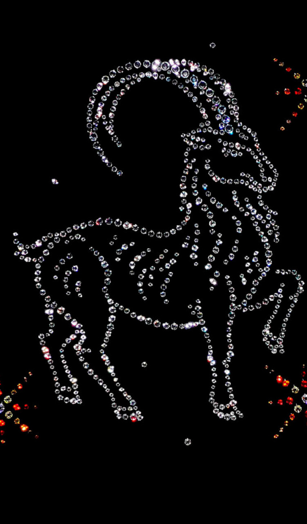 Блестящий знак зодиака козерог  на черном фоне