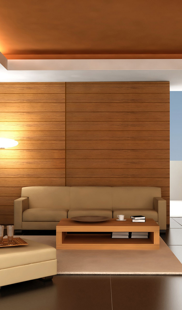 Большая комната с деревянными стенами и кожаными диванами